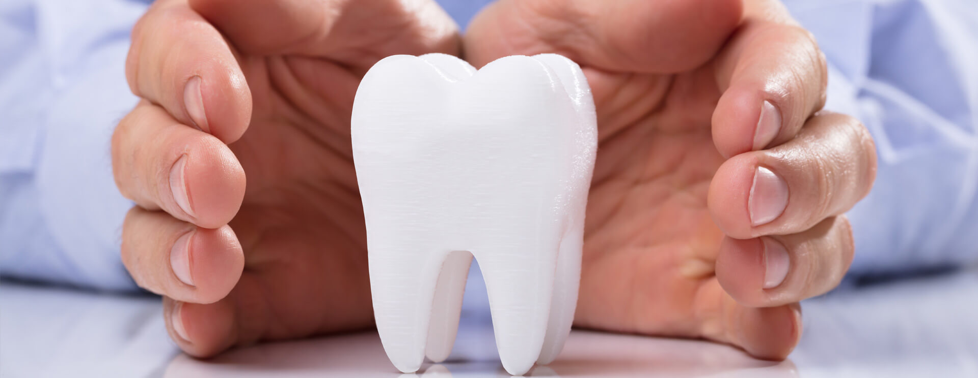 Tooth structure protected with 2 hands
